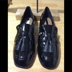 Tahari Tina patent leather tassel black loafers.